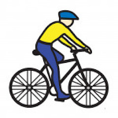 Henkilö, jolla on keltainen paita ja siniset housut ja kypärä ajaa mustaa polkupyörää.